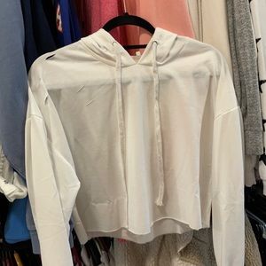 White cropped hoodie with cut designs